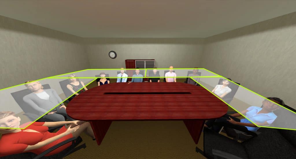 A formal business conference room is shown. The audience is divided into zones in a wide U shape, so all feel spoken to.